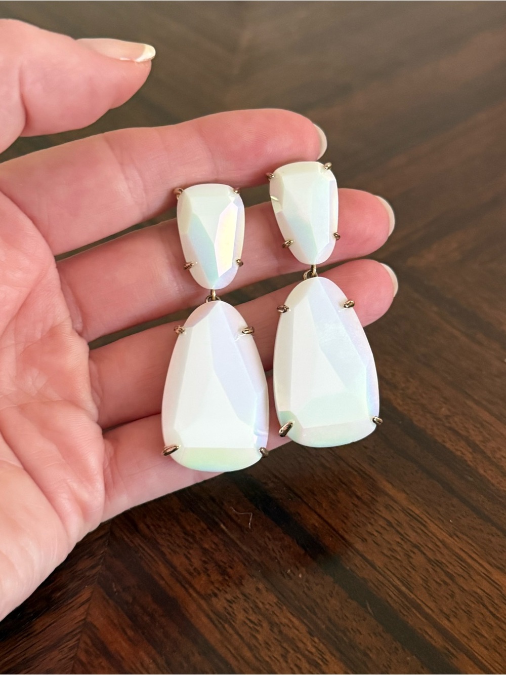 Iridescent, white dangle Kendra Scott earrings